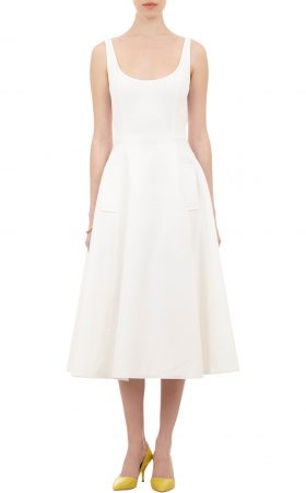 Біла коктейльна сукня