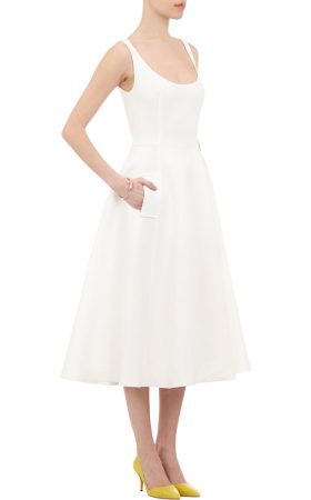 Біла коктейльна сукня