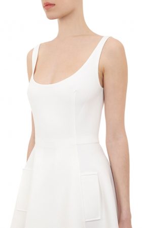 Біла коктейльна сукня