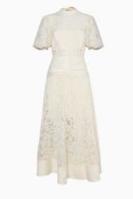 Біла мереживна сукня з рукавами буфами