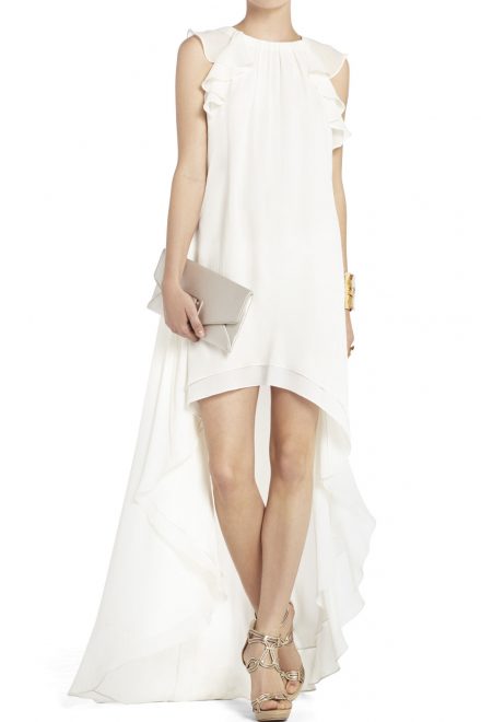 Біла сукня з асиметричним подолом
