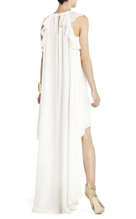 Біла сукня з асиметричним подолом
