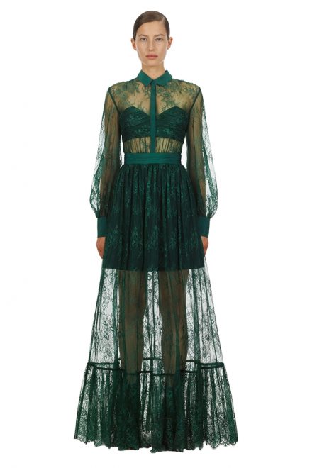 Напівпрозора довга сукня глибокого зеленого відтінку