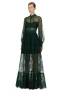 Напівпрозора довга сукня глибокого зеленого відтінку