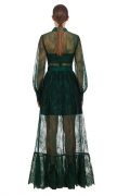 Напівпрозора довга сукня глибокого зеленого відтінку