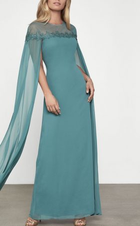 Бірюзова сукня-кейп з прозорими рукавами