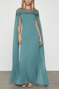 Бірюзова сукня-кейп з прозорими рукавами