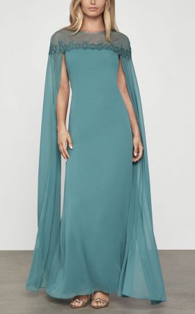 Бірюзова сукня-кейп з прозорими рукавами