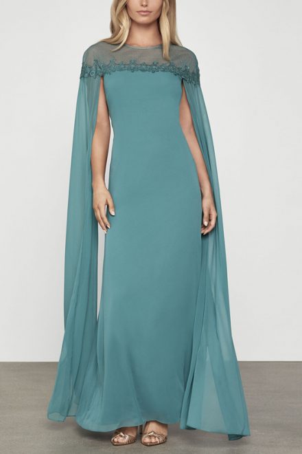 Бірюзова сукня-кейп з прозорими рукавами