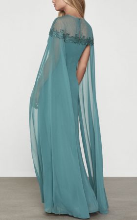 Бірюзова сукня-кейп з прозорими рукавами