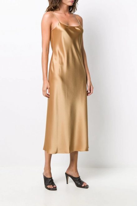 Золотиста сукня на тонких бретелях