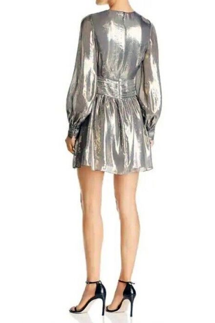 Срібляста мінісукня із довгим рукавом