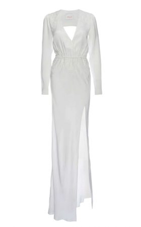Вишукана біла сукня із глибоким вирізом